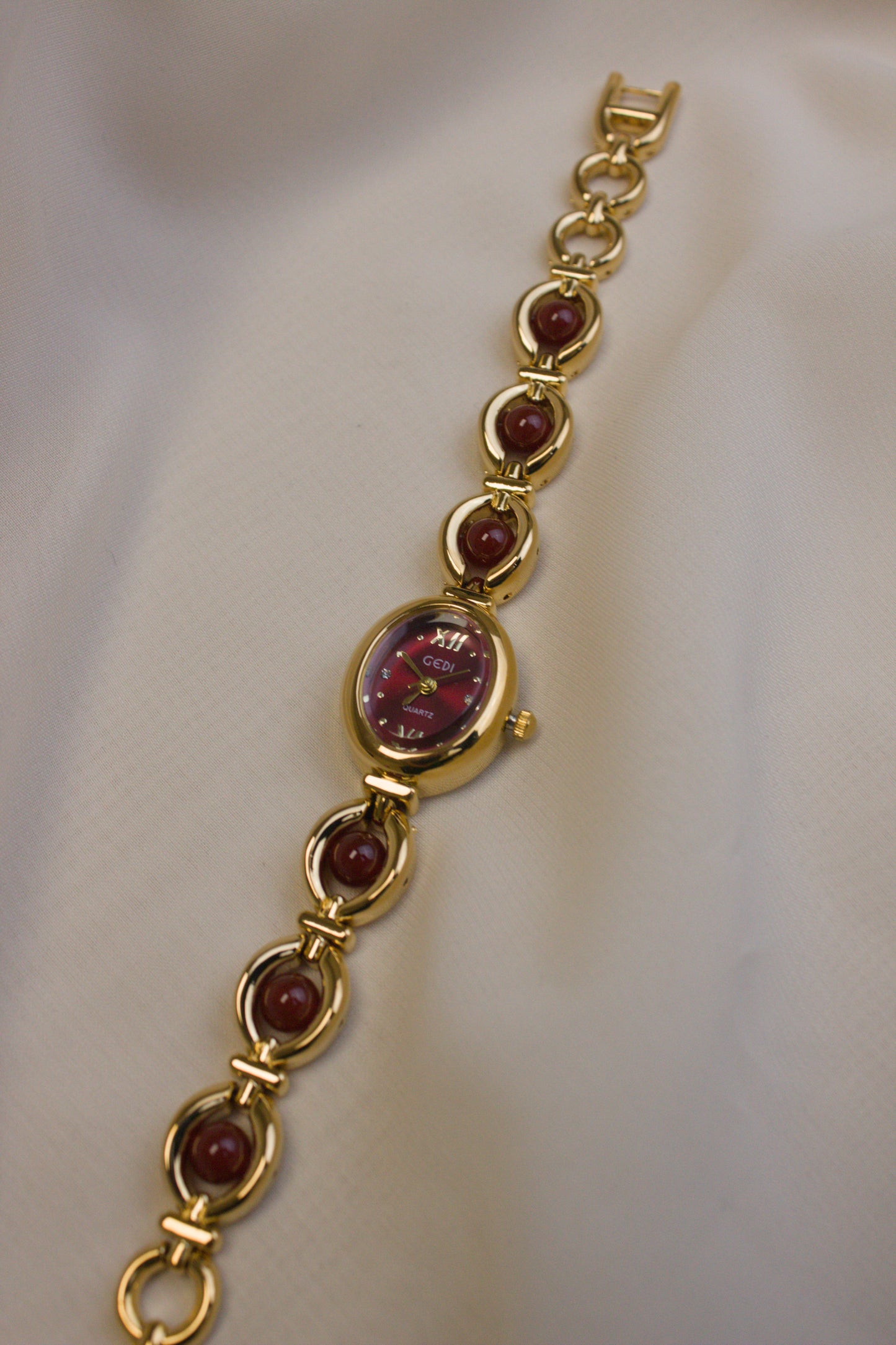 GEDI Gold Oval Garnet-Loop Watch (photo 1)