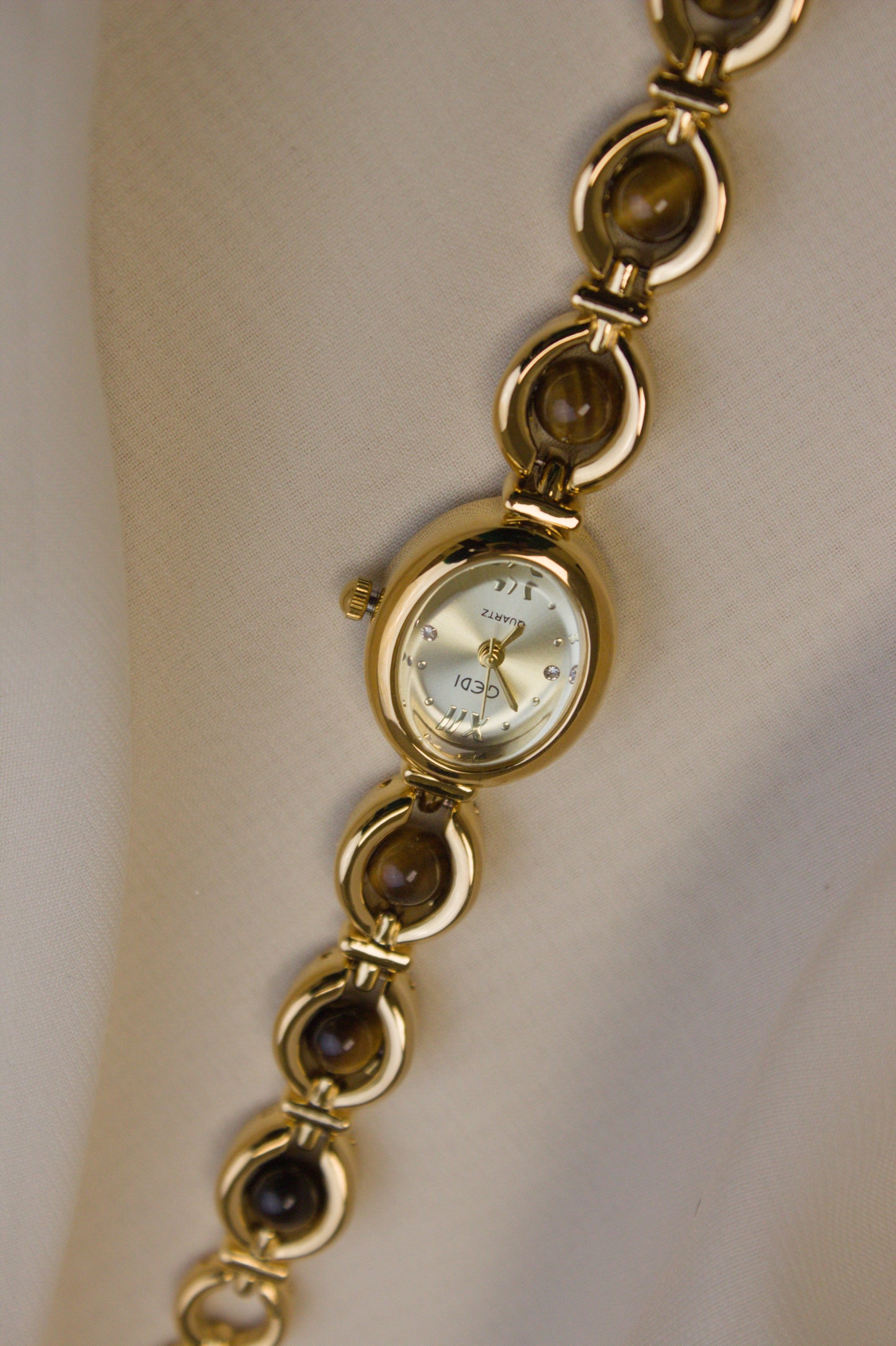 GEDI Gold Oval Tiger's-Eye Loop Watch (photo 1)