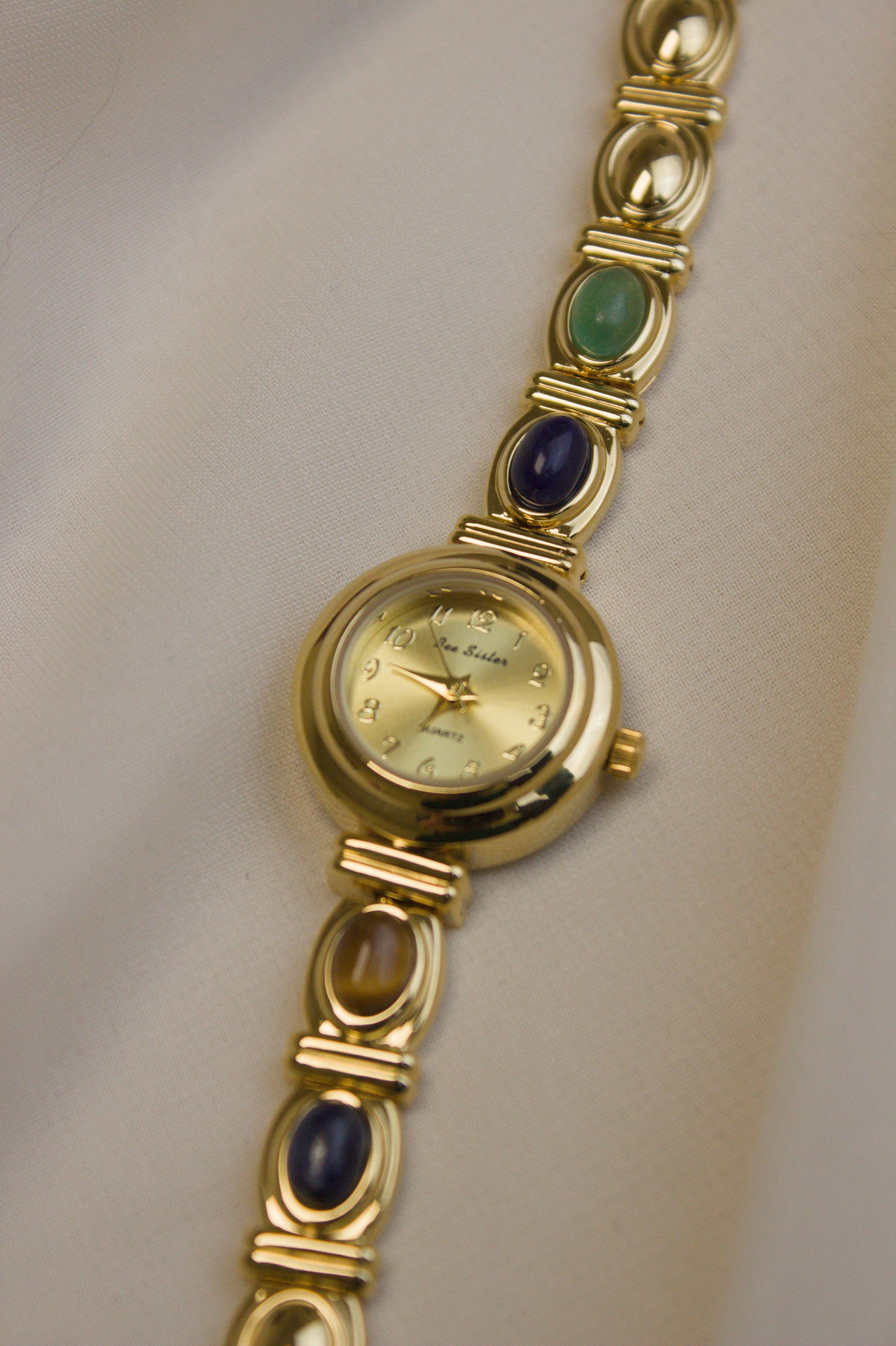 Gold Round Rainbow Cabochon Bar Watch (photo 1)