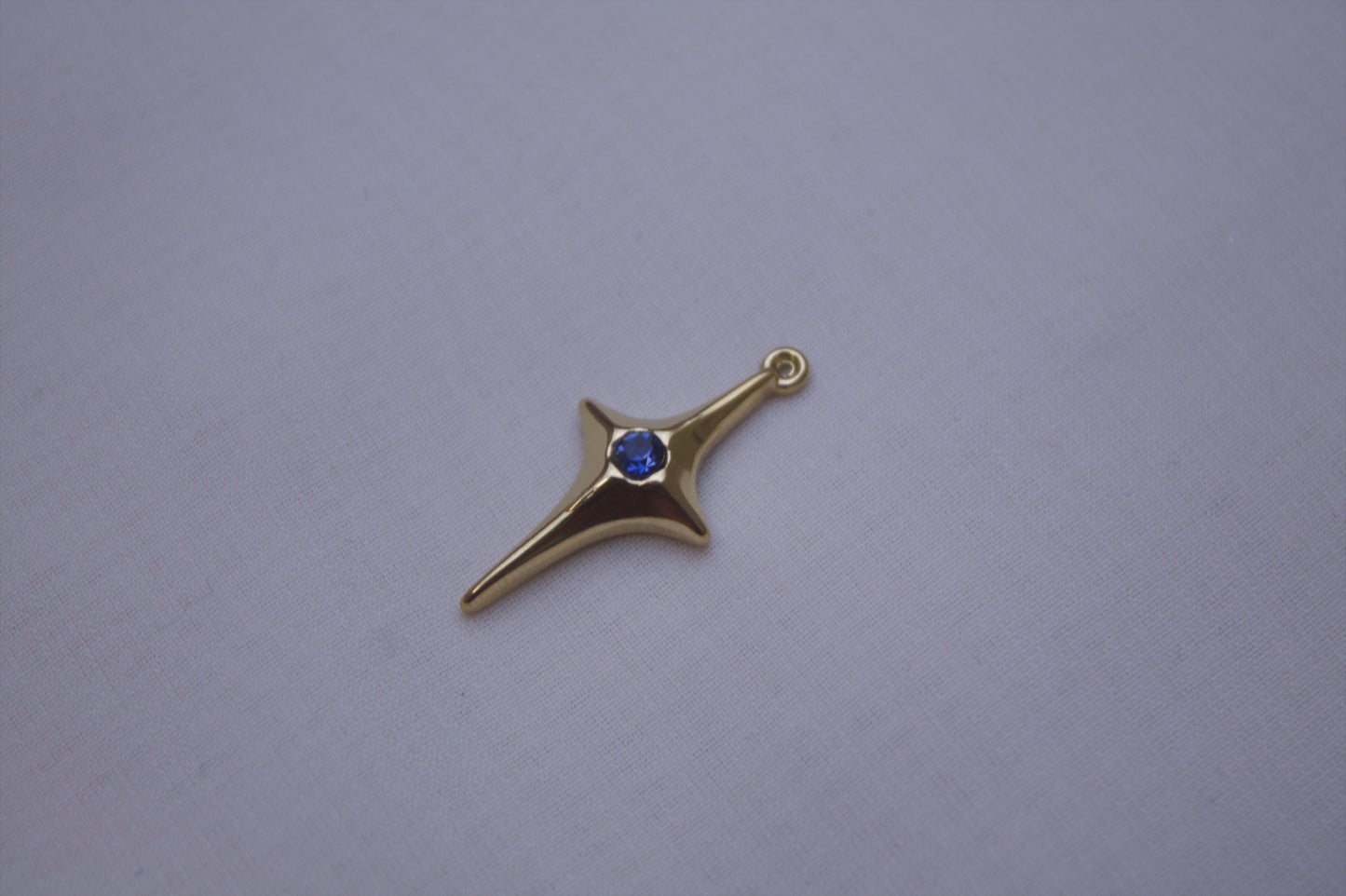Classic Gold North Star with Navy Gem Charm